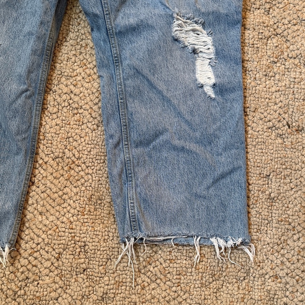 Good American Ripped Ankle Jeans in Light Blue - Picture 5 of 10